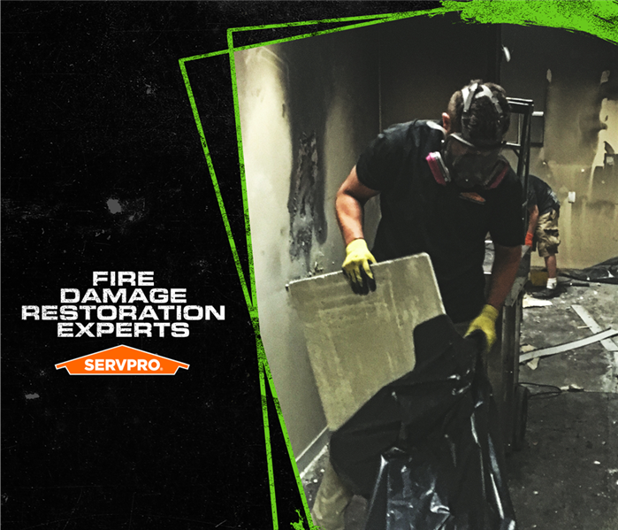 poster of fire damage restoration experts, tech in mask
